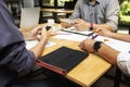 Business team meeting and discussing project plan. Businessmen using smartphone in meeting room. Professional investor working Royalty Free Stock Photo