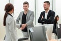 Business team meeting a new colleague at the workplace Royalty Free Stock Photo