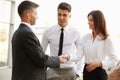 Business Team. People shake hands communicating with each other