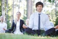 Business team practicing yoga Royalty Free Stock Photo