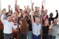 Business team raising their hands up to celebrate victory Royalty Free Stock Photo