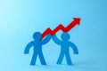 Business team and red up arrow. Sales growth and growth graph up. Royalty Free Stock Photo