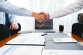 Business Team shaking hands with Investment Entrepreneur Trading discussing and analysis graph stock market trading,stock chart Royalty Free Stock Photo