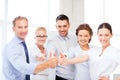 Business team showing thumbs up in office Royalty Free Stock Photo