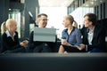 Business team sitting in office lobby Royalty Free Stock Photo