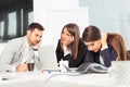 Business team sitting sad and solving problem in office