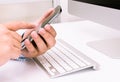 Business team with smartphone and keyboard computer at hand