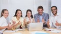 Business team smiling at camera showing thumbs up Royalty Free Stock Photo