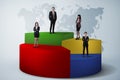 Business Team Standing On Pie Chart Royalty Free Stock Photo