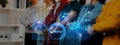 Business Team Standing Together with Graph Data Visualization Overlaid in Modern Office Environment for Corporate Royalty Free Stock Photo