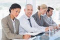 Business team taking notes during conference Royalty Free Stock Photo