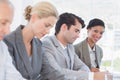 Business team taking notes during conference Royalty Free Stock Photo