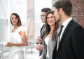 Business team talking standing in the office corridor Royalty Free Stock Photo
