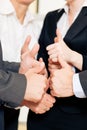 Business team thumbs up Royalty Free Stock Photo