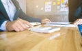 Business team using a calculator analysis data documents and using calculator Royalty Free Stock Photo
