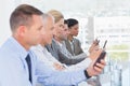 Business team using their mobile phone Royalty Free Stock Photo