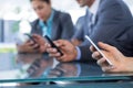 Business team using their mobile phone Royalty Free Stock Photo