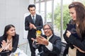 Business team winning trophy in the office . Businessman with te Royalty Free Stock Photo