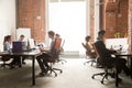 Business team workers working on computers in modern coworking enterprise Royalty Free Stock Photo