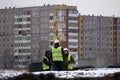 Business, teamwork and people concept - group of smiling builders in helmets website Builder-Russia Berezniki Nov 23, 2017