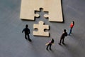 Business teamwork with puzzle finishing project cooperation unity concept. Royalty Free Stock Photo