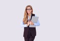 Business and technology. Beautiful happy woman eyeglasses looking at camera and smiling, half turn. Holding  laptop in one hand Royalty Free Stock Photo