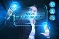 Business, Technology, Internet and network concept. Businessman presses a button Code of conduct on the virtual screen tablet Royalty Free Stock Photo