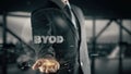 BYOD with hologram businessman concept