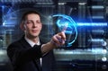 Business, Technology, Internet and network concept. Young businessman working on a virtual blackboard of the future, he sees Royalty Free Stock Photo