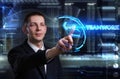 Business, Technology, Internet and network concept. Young businessman working on a virtual blackboard of the future, he sees Royalty Free Stock Photo