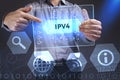 Business, Technology, Internet and network concept. Young businessman showing a word in a virtual tablet of the future: IPv4 Royalty Free Stock Photo