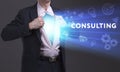 Business, Technology, Internet and network concept. Young businessman shows the word: Consulting