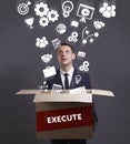 Business, Technology, Internet and network concept. Young businessman shows the word: Execute Royalty Free Stock Photo