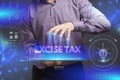 Business, Technology, Internet and network concept. Young businessman shows the word on the virtual display of the future: Excise Royalty Free Stock Photo