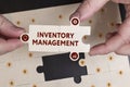 Business, Technology, Internet and network concept. Young businessman shows the word: Inventory management