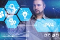 Business, Technology, Internet and network concept. Young businessman shows the word on the virtual display of the future: IPv4