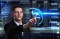 Business, Technology, Internet and network concept. Young businessman working on a virtual blackboard of the future, he sees Royalty Free Stock Photo