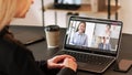 Business teleconference video man women laptop