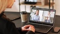 Business teleconference video man women laptop Royalty Free Stock Photo