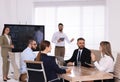 Business training. People in meeting room with interactive board Royalty Free Stock Photo
