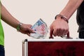 Business transfer deal. handover of a suitcase for money Royalty Free Stock Photo