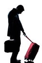 Business traveler man tired with suitcase Royalty Free Stock Photo