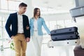 Business travelers put baggage on X-ray machine try to detection metal prevention at the airport Royalty Free Stock Photo