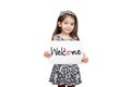 Business welcome concept, Cute girl holding a welcome sign stand