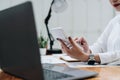 business woman or accountant working on calculator to calculate business data, accountancy document and laptop computer Royalty Free Stock Photo