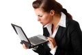 Business woman amazedly looks in laptops screen Royalty Free Stock Photo