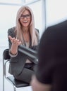 Business woman answering questions during an interview. Royalty Free Stock Photo