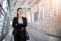 Business woman with arms crossed in city Royalty Free Stock Photo