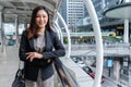 Business woman with arms crossed in city Royalty Free Stock Photo