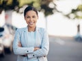 Business woman, arms crossed and portrait in a city with a smile from worker success. Young female person, professional Royalty Free Stock Photo